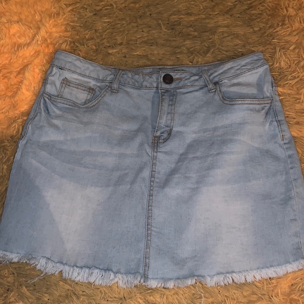 Blue Jean mini skirt. Literally brand new! Size large fits like medium.